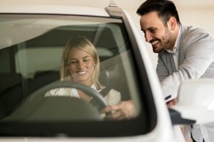 women driving car