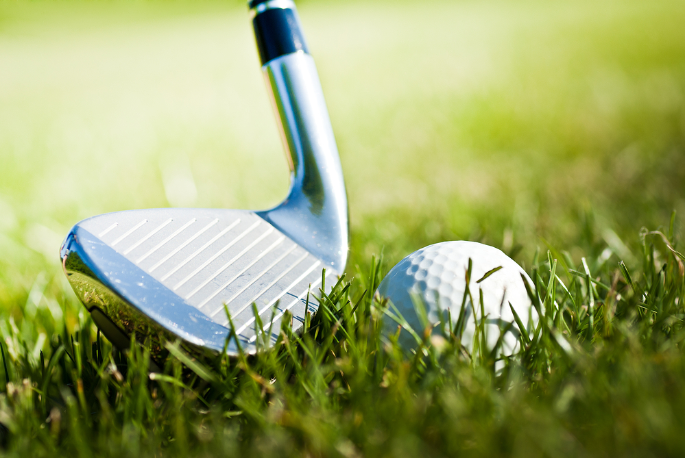 Gold Club and Golf Ball