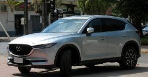 A silver Mazda CX-5 parked on the street in Wichita, KS