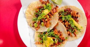Three servings of tacos pastor from a local Mexican restaurant in Wichita, KS