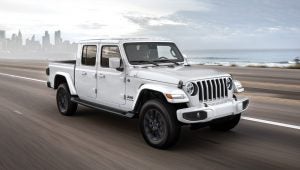 White 2020 Jeep Gladiator Driving Down Highway