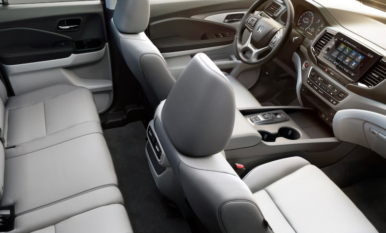 The 2026 Honda Ridgeline is a midsize unibody pickup truck offering 280-horsepower V6 engine and a lockable in-bed trunk.