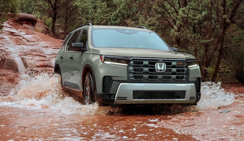 The 2026 Honda Pilot is a three-row SUV featuring a powerful 285-horsepower V6 engine and an updated 12.3-inch touchscreen.