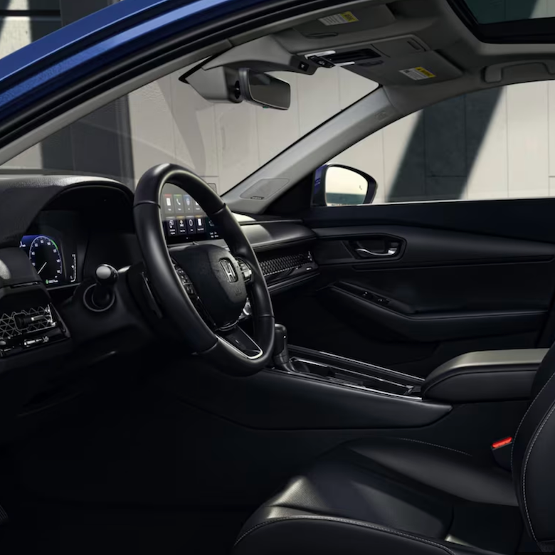 The 2025 Honda Accord is a midsized sedan that uses the Honda Sensing suite to host safety features such as lane keeping.