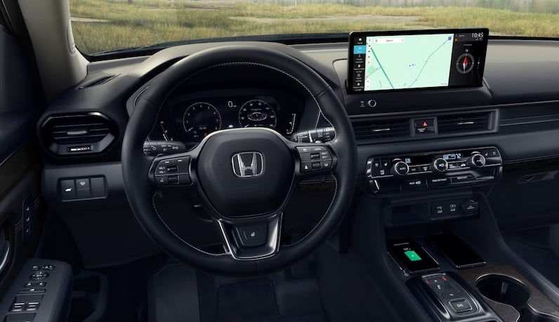 The 2026 Honda Pilot is a three-row SUV featuring a powerful 285-horsepower V6 engine and an updated 12.3-inch touchscreen.
