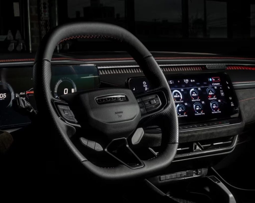 The 2026 Dodge Charger is a twin-turbocharged muscle car available in AWD two-door coupe and four-door sedan body styles.