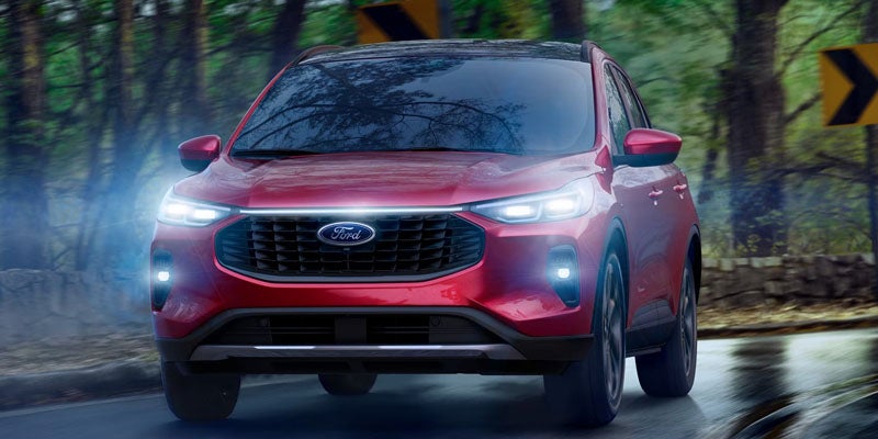 Red 2026 Ford Escape with its stunning look cruising on road