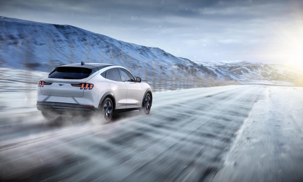 Ford Mustang Mach-E driving in winter