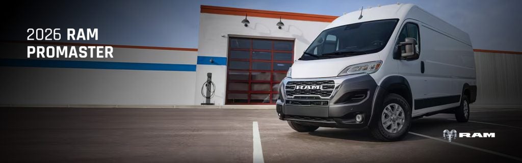 Ram ProMaster parked outside a service building.