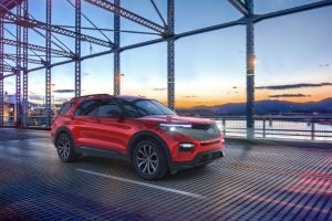 Red 2020 Ford Explorer Driving on Bridge