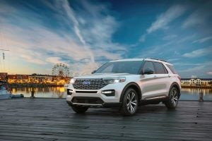 White 2020 Ford Explorer in Front of Ferris Wheel