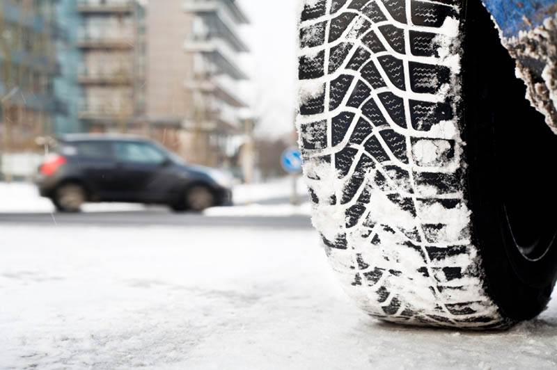 Car Driving through Winter Conditions Winter Tires for Sale