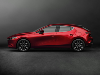 A red Mazda3 Hatchback parked