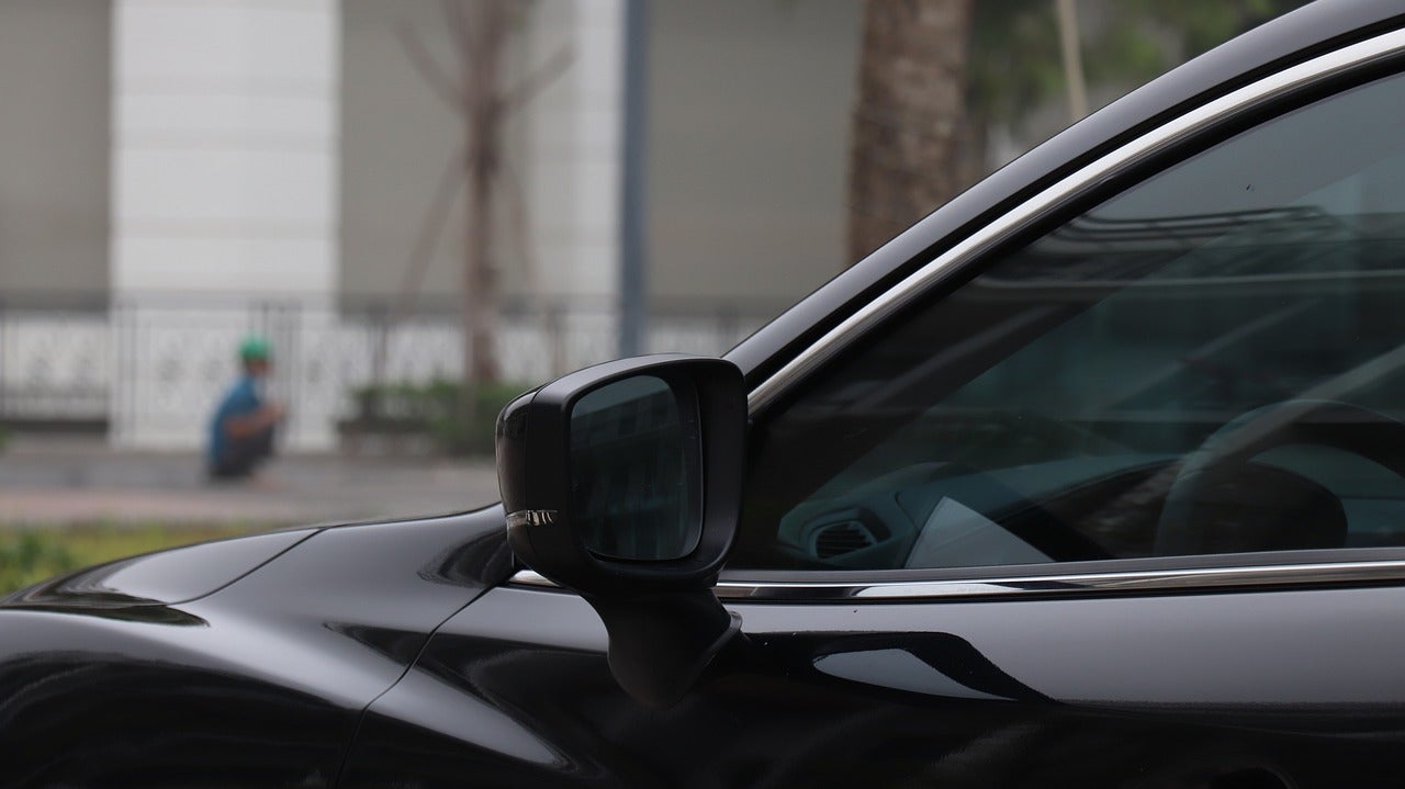 The side view of a parked car