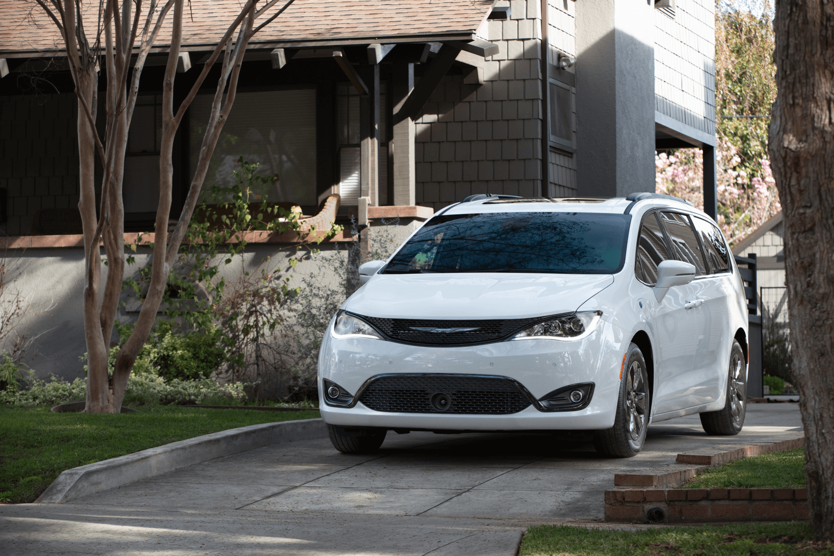 Chrysler Pacifica Limited Hybrid White Parked Driveway
