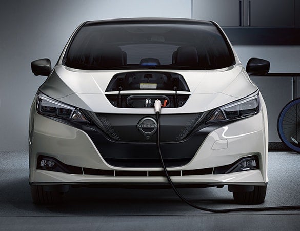 2023 Nissan LEAF being charged in a home garage