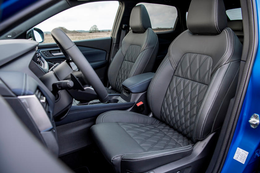 Inside view of the 2022 Nissan Rogue Sport from outside driver door.