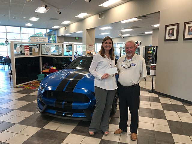 gilbert-baugh-ford-presents-check-to-shepherds-cove-hospice