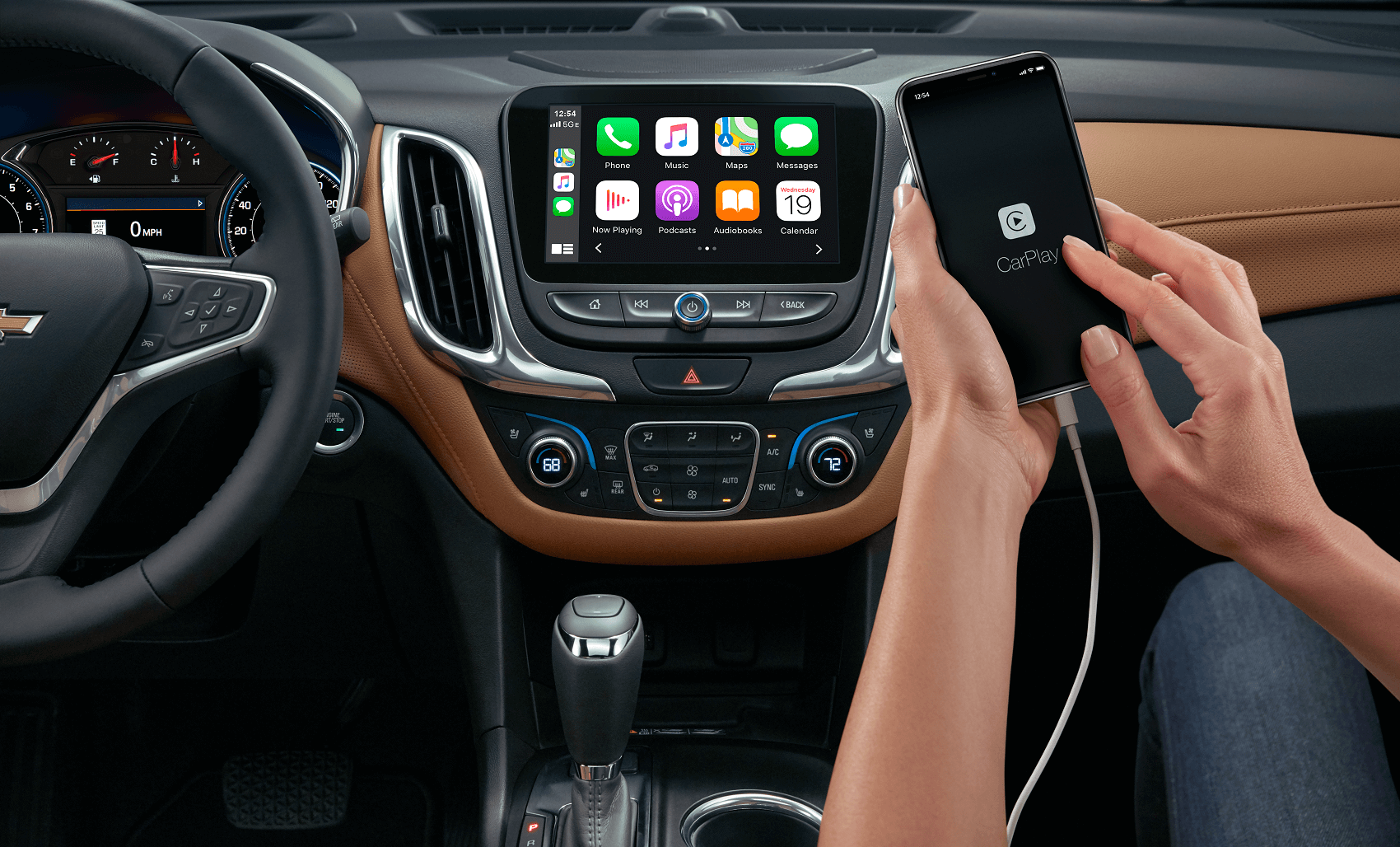 Chevy Equinox black and brown leather interior with Apple Carplay dashboard technology