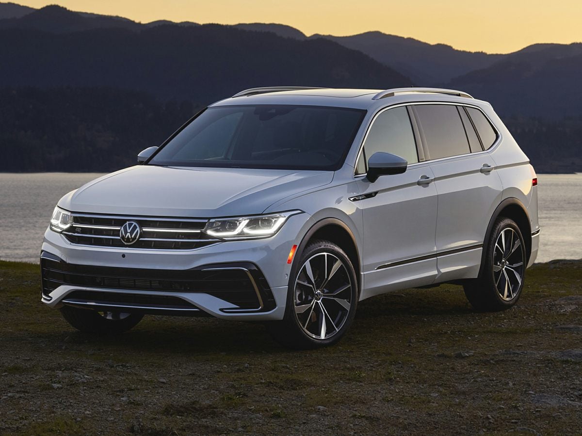 2024 Volkswagen Tiguan in front of lake and mountains