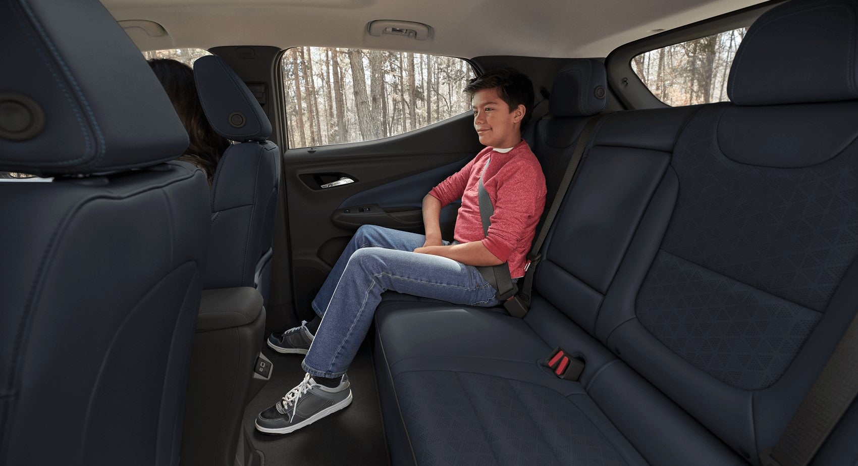 Child Sitting in Backseat of Chevy Bolt
