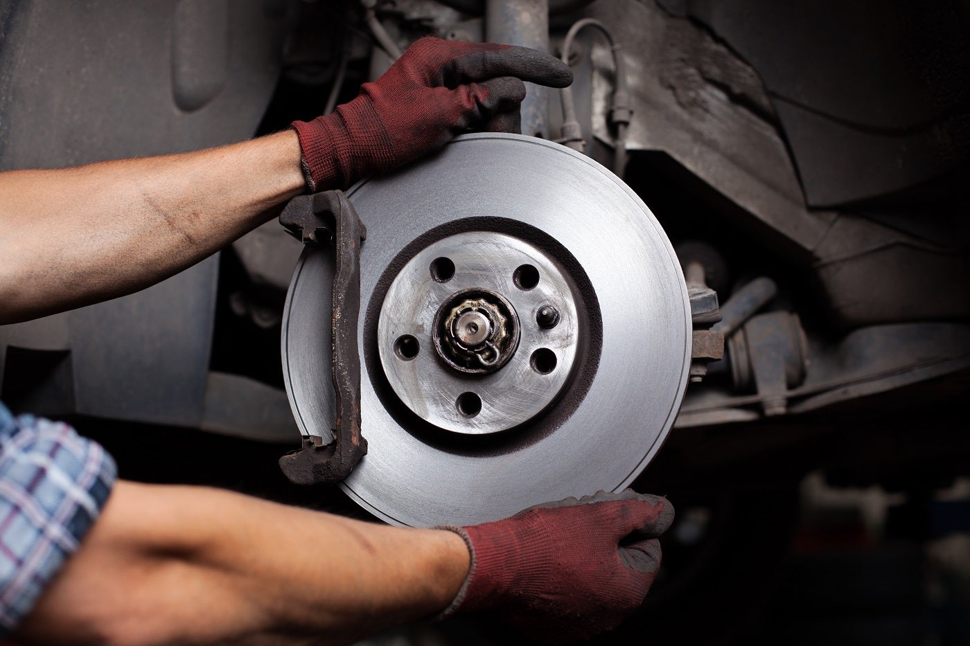 Certified Chevy technician performs brake maintenance for Chevy vehicle