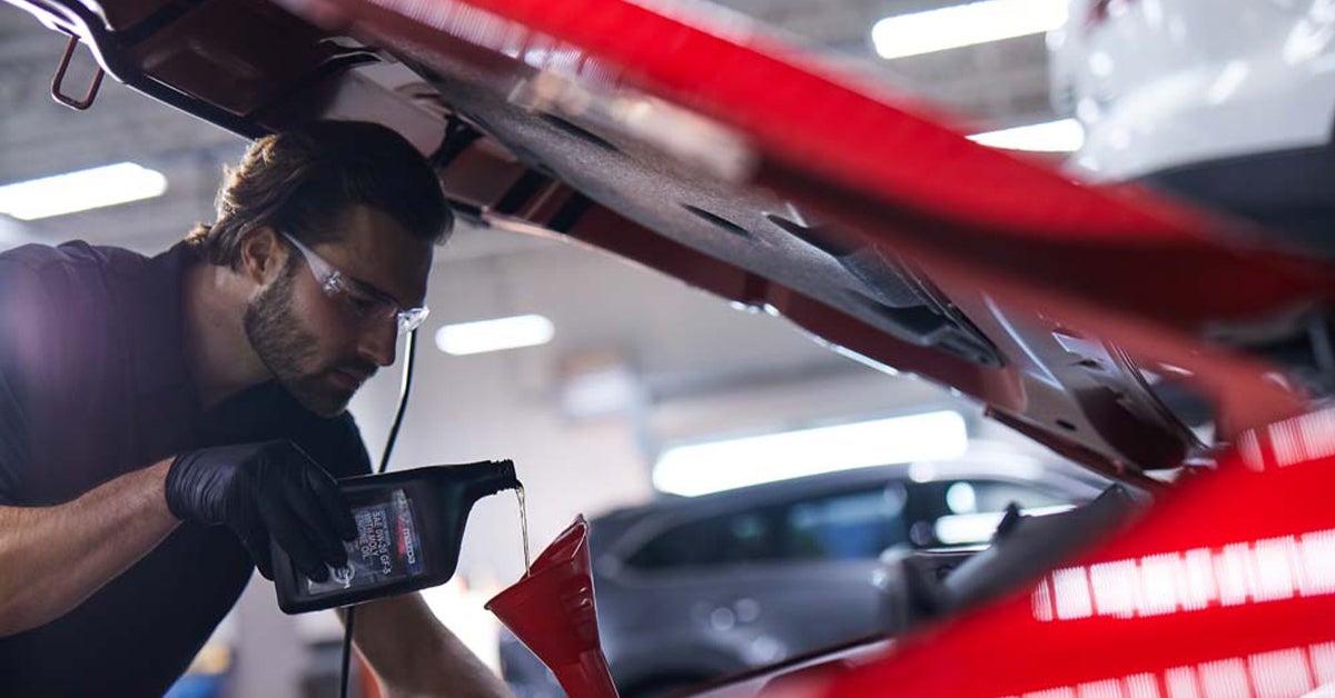 Mazda service technician prepping a vehicle for winter