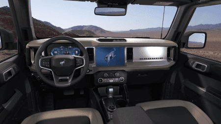 Driver using touchscreen infotainment system while driving