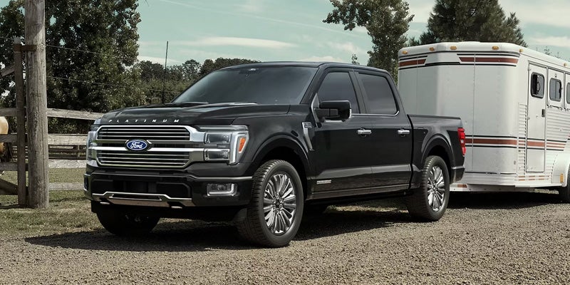 Pickup truck towing a horse trailer