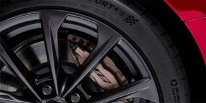 A zoomed in photo of a vehicle tire, displaying the rotor