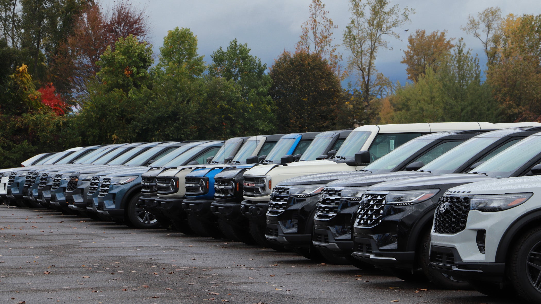 Ford SUVs and Broncos lined up on the Atchinson Ford vehicle lot