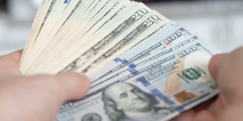 Hands counting cash