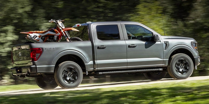 A 2025 Ford F-150 with Ford PowerBoost engine in Gray Metallic