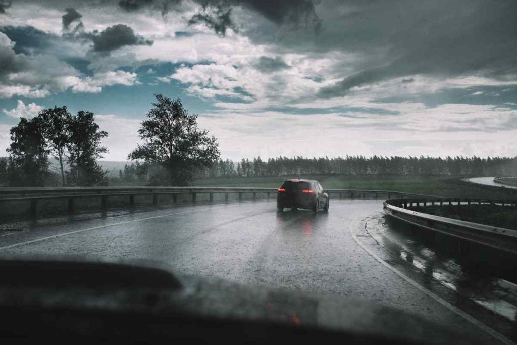 View of the open road and overcast sky on a rainy day