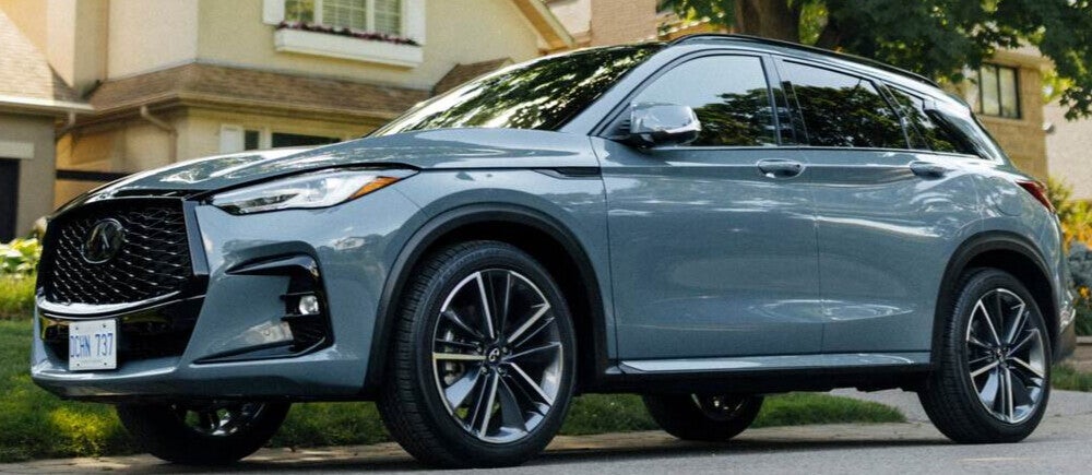  2025 INFINITI QX50 parked in front of house