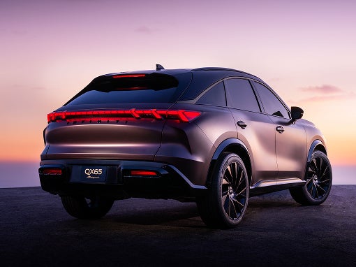 2026 INFINITI QX65 Monograph rear three-quarter view showing the fastback roofline and aircraft-inspired taillights