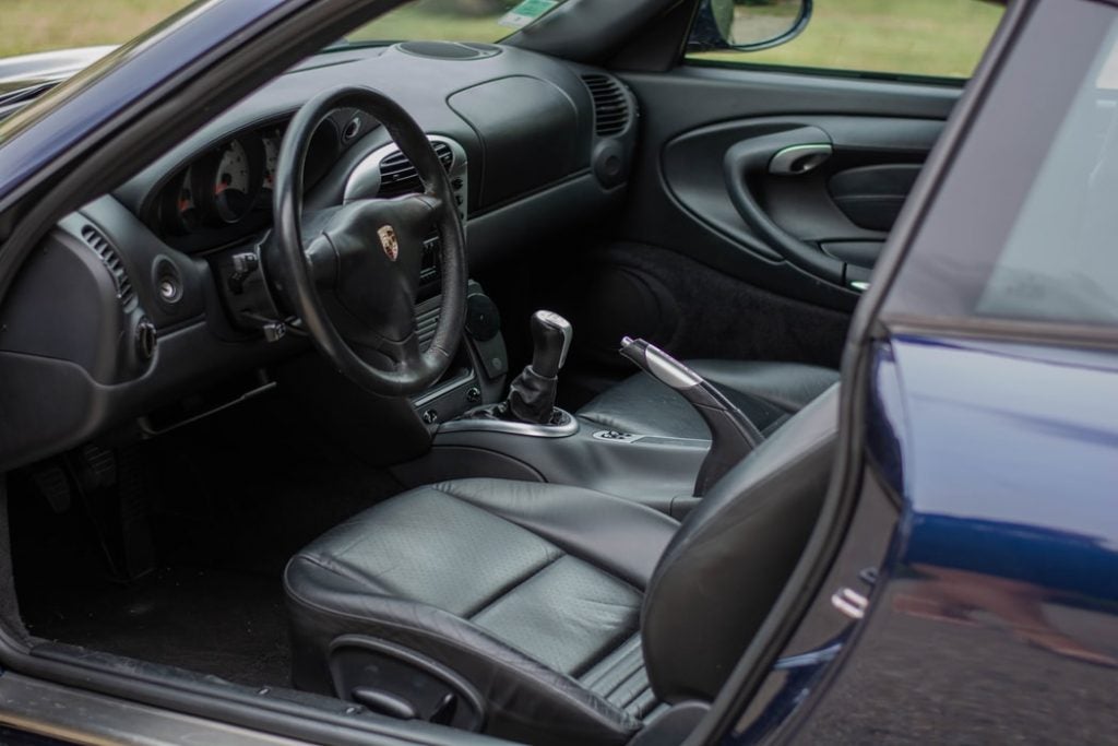 the interior of a porsche as a visual for an air conditioning service
