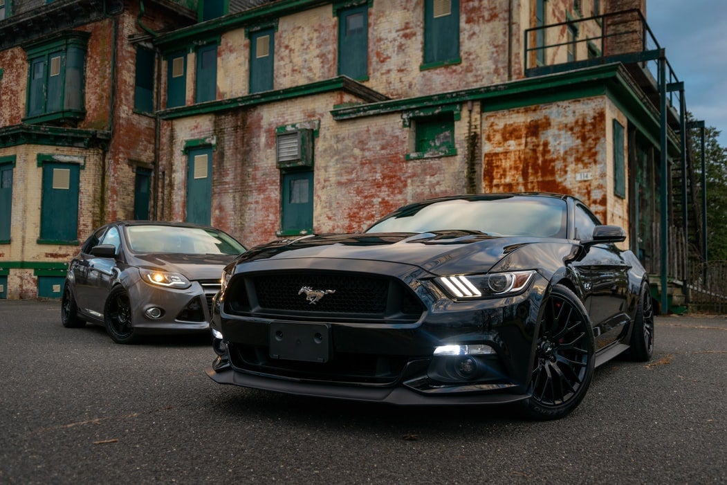 a-gray-mustang-in-a-back-alley-of-Joplin-MO