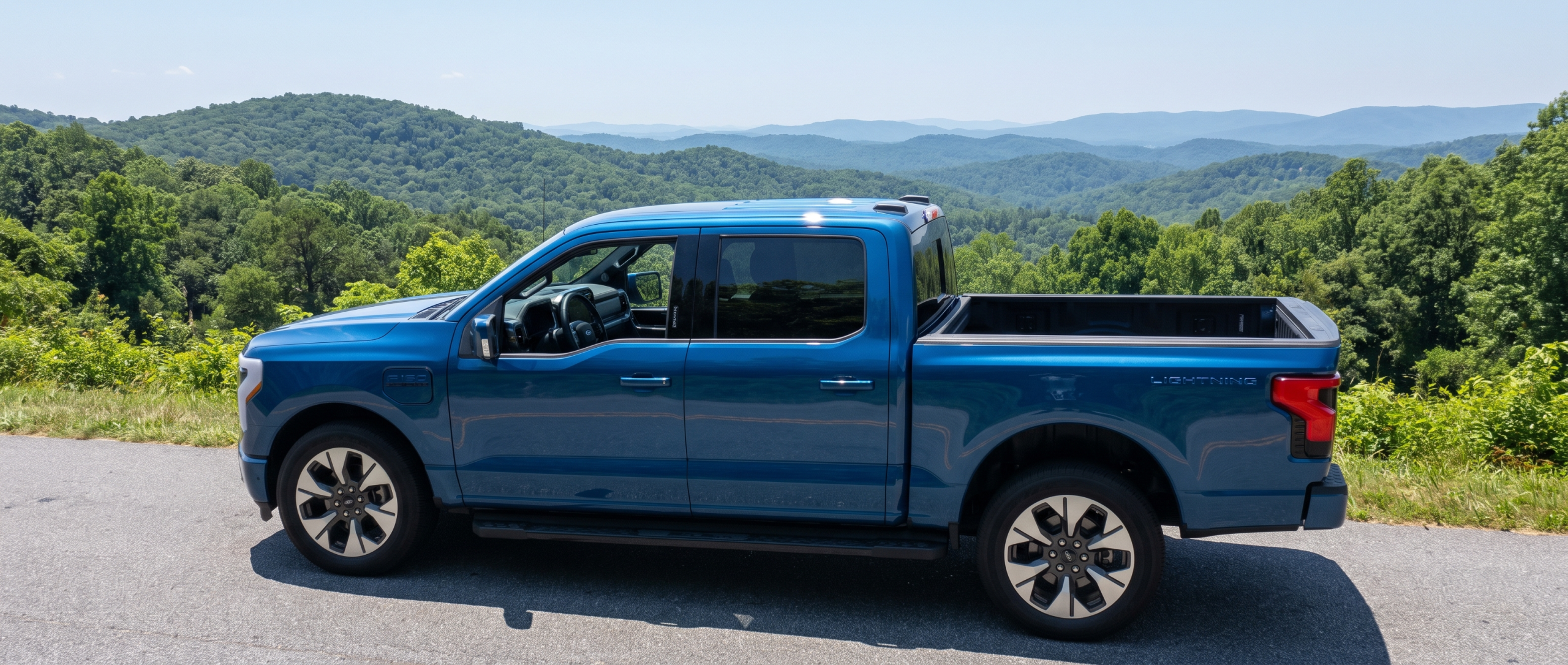 2025 Ford F-150 Lightning parked on an Upstate South Carolina road near Greenville County in summer