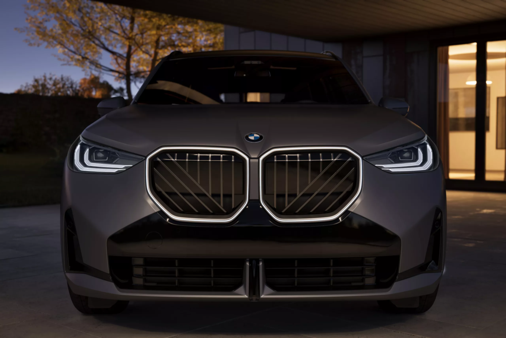The front grille of the 2026 BMW X3 30 in the 30 xDrive trim level parked outside a home in Berkeley, CA 