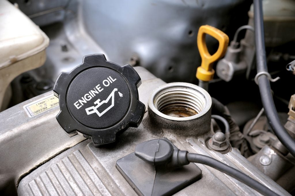 Checking a used car for oil leak before buying