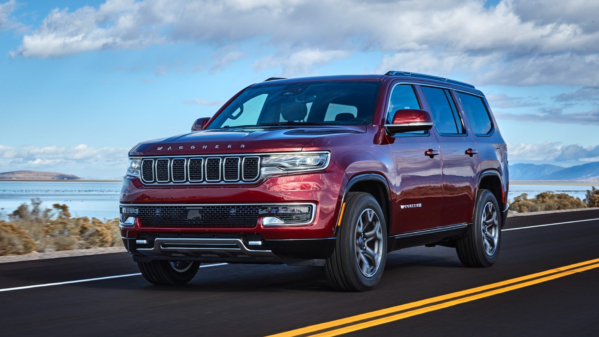 All new 2022 Jeep Wagoneer driving down South Florida highway towards Stuart, FL.