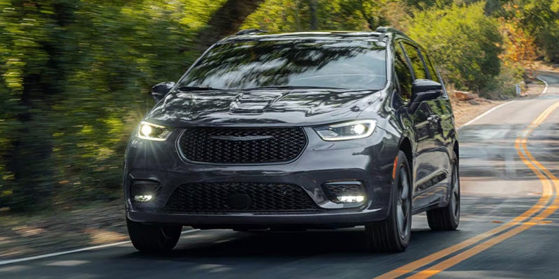 2026 grey Chrysler Pacifica cruising on road 
