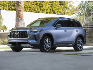 silver 2024 INFINITI QX60 parked in driveway