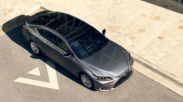 grey Lexus 350 driving down the road in El Monte, California