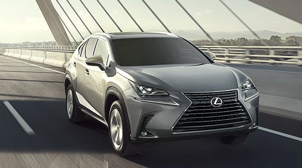 Grey Lexus nx-300 hybrid driving on a road in El Monte, CA