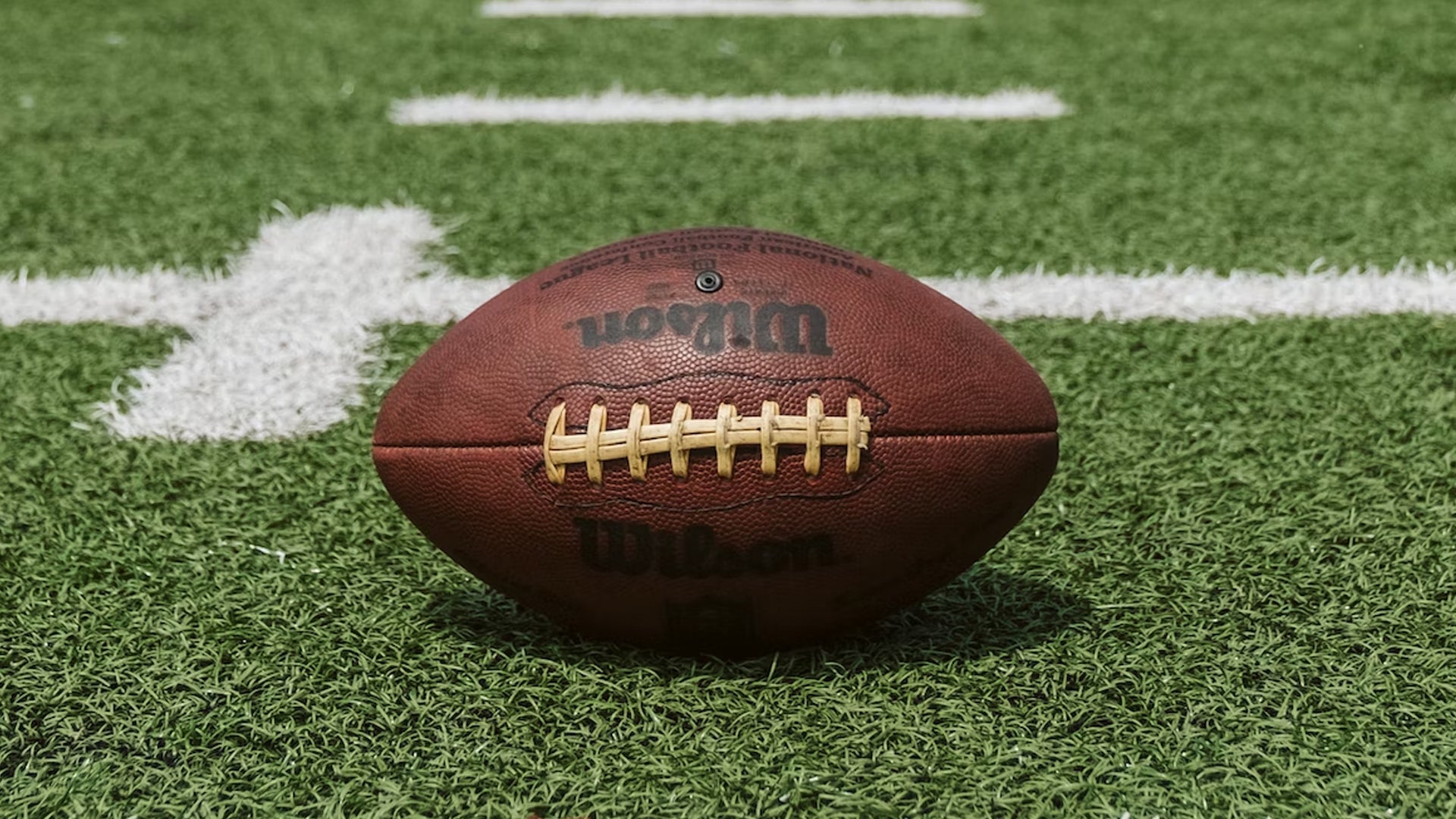 Football-Laying-On-Turf