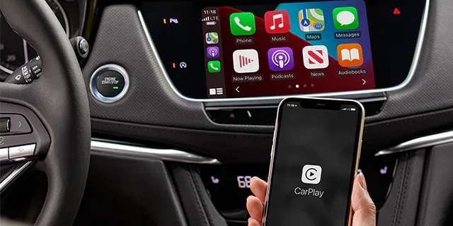 Phone and the Center Console in a Cadillac car featuring different apps