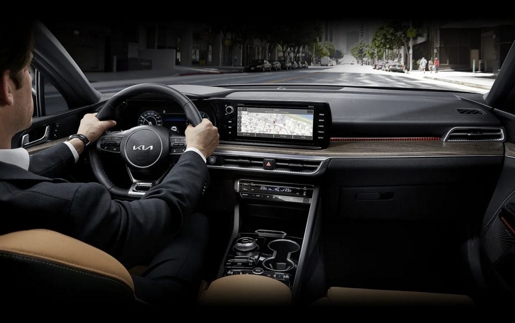 A Stuart Resident driving the 2022 Kia K5 purchased from Wallace Kia