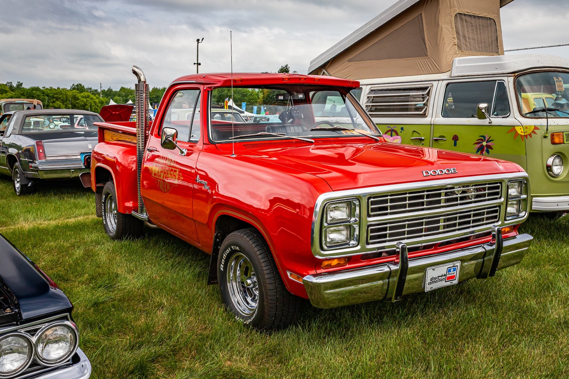 High perspective front corner view of a 1979 Dodge “Lil’ Red Express” Pickup Truck at a local car show.